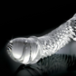 Close-up of the lifelike head on the Icicles No. 61 Textured Glass G-Spot Dildo w/ Balls from Pipedreams (clear).