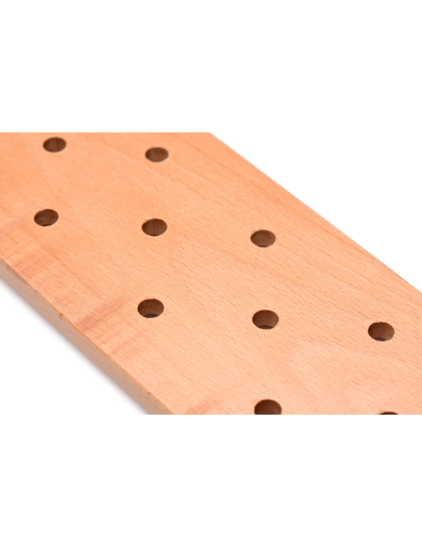Close-up view of the wooden paddle showing the airflow holes.