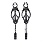 Front view of the clover nipple clamps show their length and structure (black).