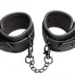 Image of the ankle cuffs buckled and connected to one another by the short chain.