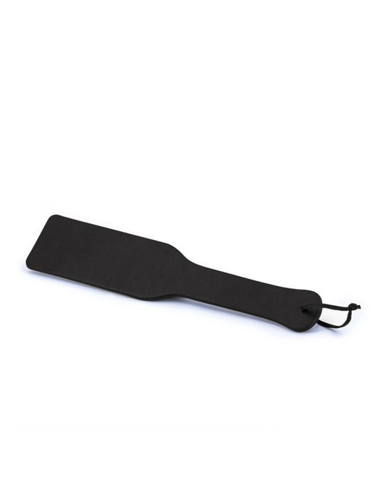 Side angle view of the Bondage Couture Paddle from NS Novelties (black).