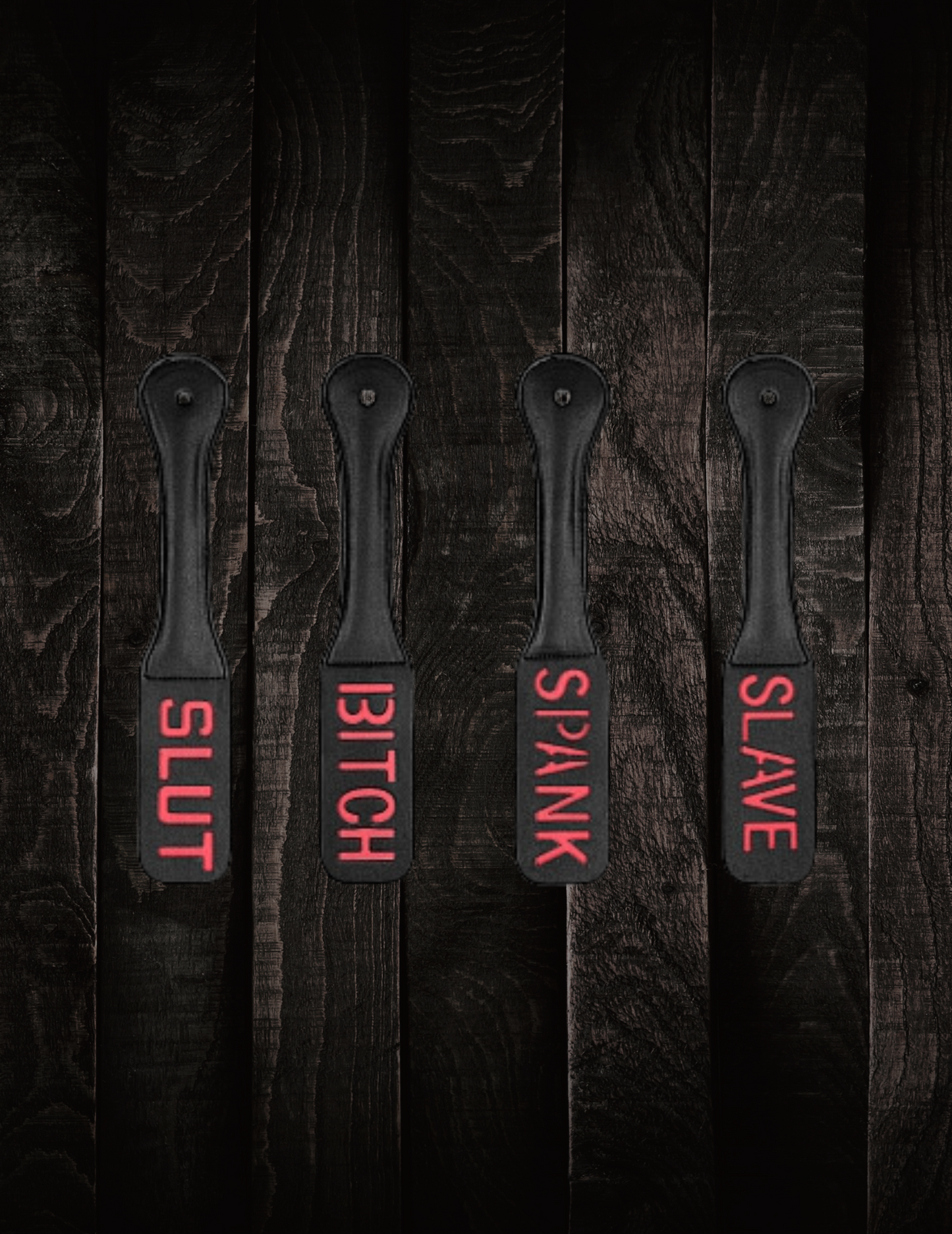 Group images of the Ouch! Bonded Leather Paddles from Shots.