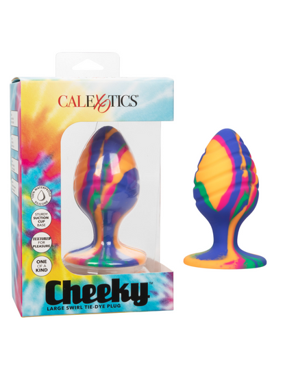 Photo shows the Cheeky Swirl Tie Dye Silicone Plug, from CalExotics (large), next to its box.