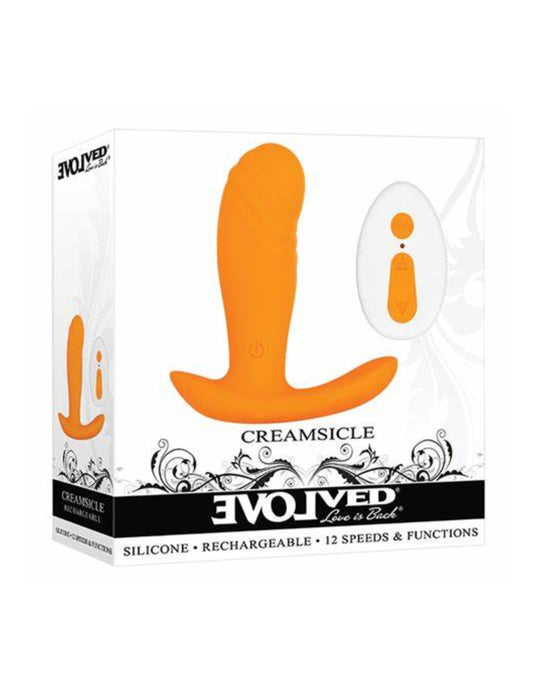 Evolved Creamsicle Silicone Rechargeable Wearable Vibrator w/ Remote Control (Orange/White) in its box.
