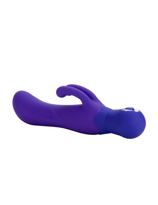 Side view of the Photo shows the back of the box for the Double Dancer from CalExotics (purple) shows its small size and dainty clitoral stimulator.