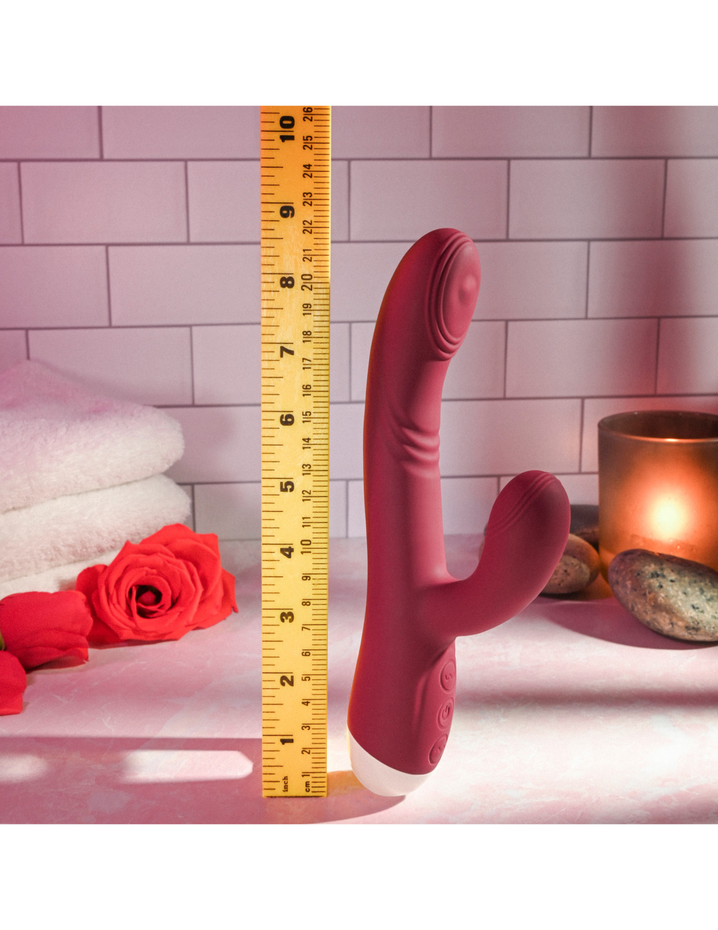 Photo shows the  Double Tap G-Spot Vibrator by Evolved next to a ruler to show its size.