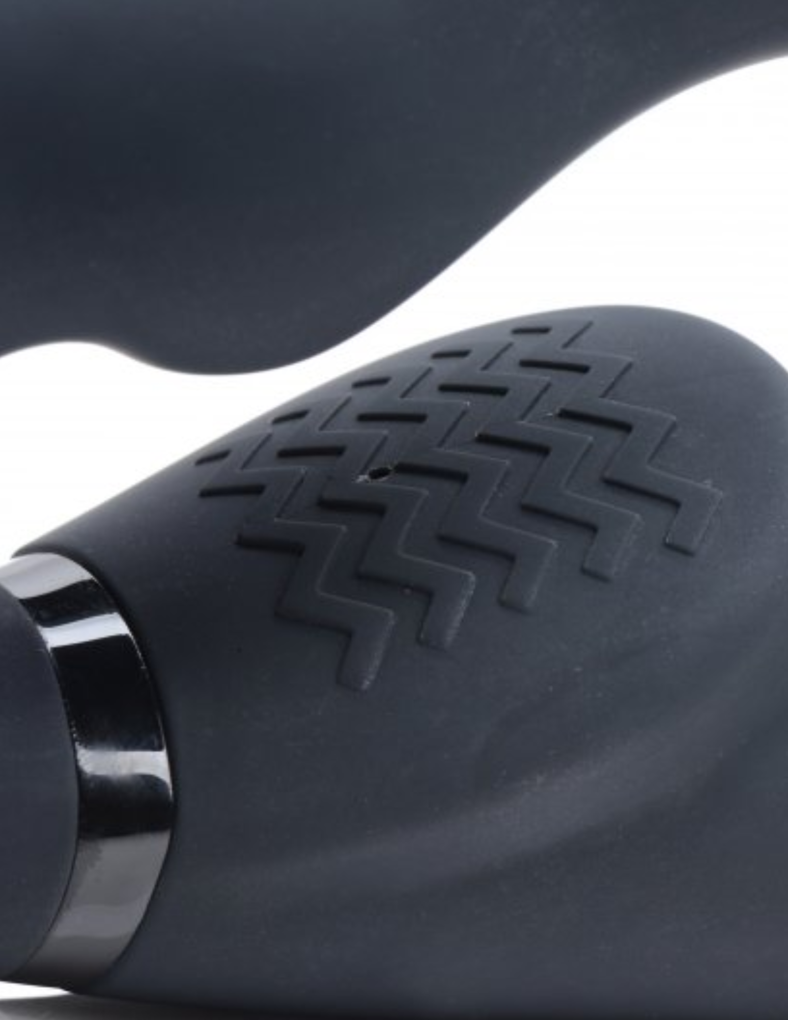 Close-up of the texture of the portion of the Strap U Ergo-Fit Twist Inflatable Strapless Strap-On from XR Brands (black) that rubs against the clitoris of the wearer.