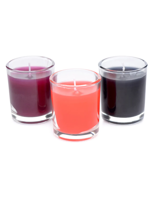 Flame Drippers Candles in 3 colors: purple, red and black.