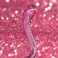 Profile photo of the Icicles No. 69 Textured G-Spot Glass Probe from Pipedreams (pink) shows its curved top and bottom, as well as its ribbed shaft.