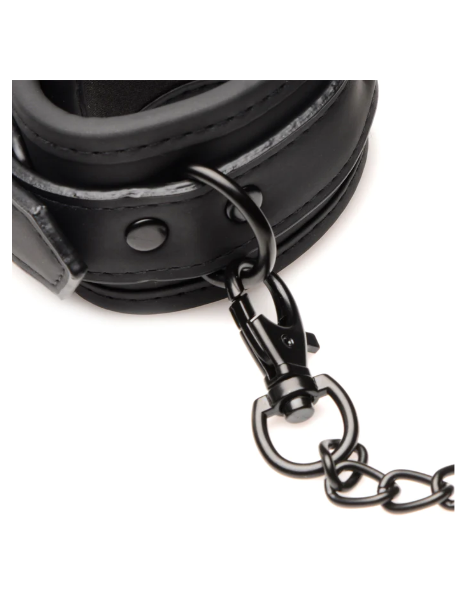 Close-up of the hardware on the collar and leash from the Master of Kink PU Leather Deluxe Bondage Set by Master Series and XR Brands..