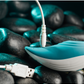 Palm Pleasure Silicone Rechargeable Thumping Clitoral Massager - (Teal/White)