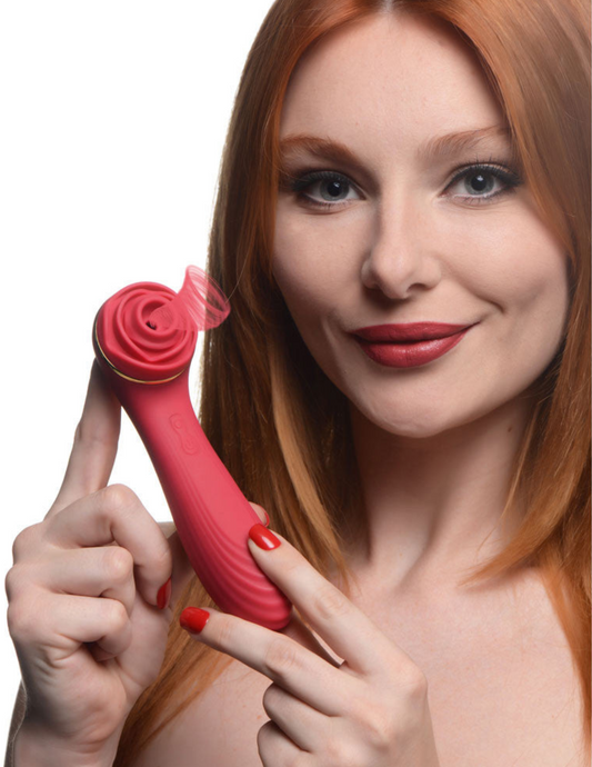 Photo shows a woman holding the Bloomgasm Passion Petals Suction Rose Stimulator (red) from XR Brands.