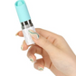 Photo of a hand holding the Pillow Talk Lusty flicking vibrator (teal) to show its size by comparison.