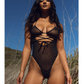 Ad with a model showing the Rhinestone Mesh Wrap Around Bodysuit from Leg Avenue (black, OS).