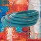 Ad for the Merge Collection Rubber O-Ring (turquoise) from Sportsheets.