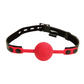 Front view of the red ball gag shows its strap and hardware.