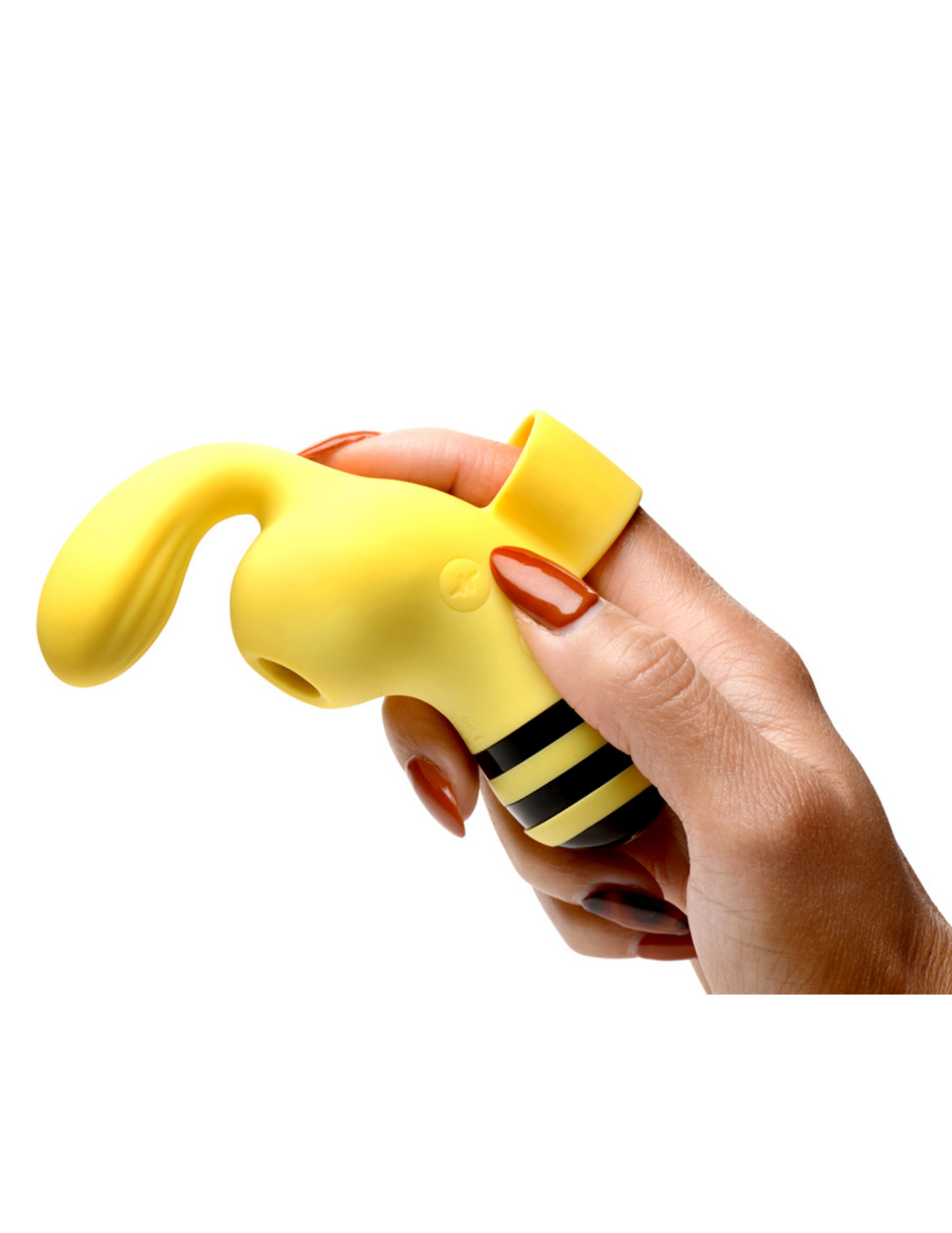 Photo of a hand wearing the Shegasm Sucky Bee Finger Vibe from XR Brands to show its comfortable fit and ergonomic shape.