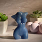 Photo ad for the LaCire Torso Candle from Sportsheets (form 3/blue).