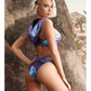Ad shows a side and back view of the Vibes Plur Bralette w/ Removeable Hood and Panty Set from Fantasy Lingerie (S-XL).