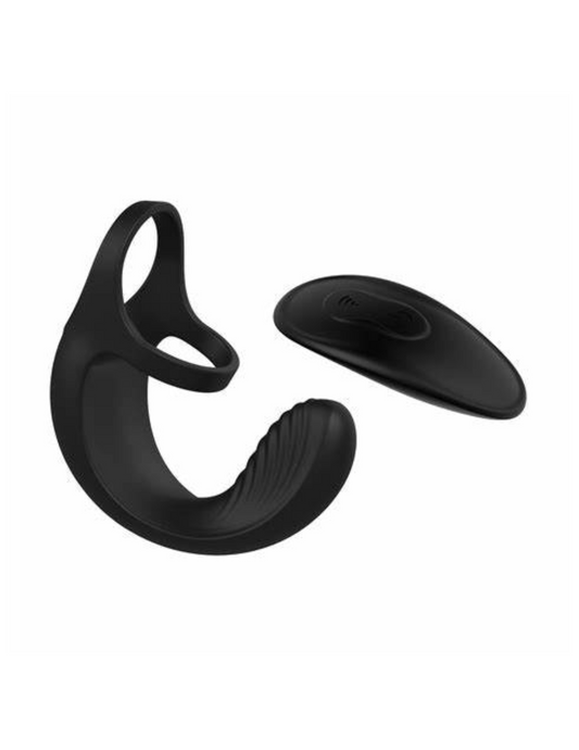 Side angle view of the Vibrating Ball Cradle Silicone Rechargeable Cock Ring w/ Remote Control from Zero Tolerance shows its ergonomic shape and textured design.