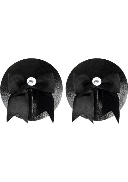 Black bow and paten leather pasties.