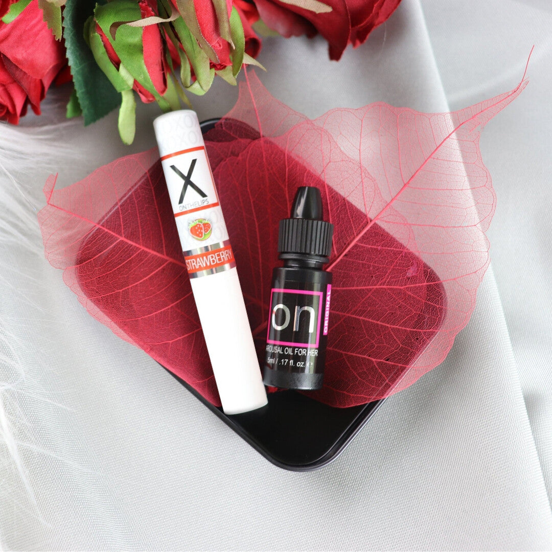 Sensuva XO Kisses and Orgasms Pleasure Kit: lip balm and "on" clitoral stimulant oil.