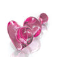 Close-up view of the heart-shaped base of the Icicles No. 75 Beaded Heart Shaped Glass Anal Plug from Pipedreams (pink).