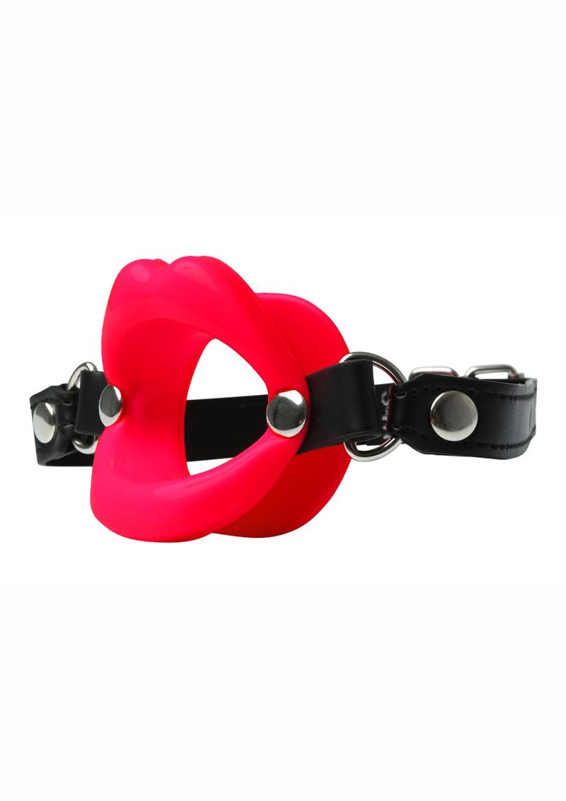 Side angle view of the lips mouth gag (red).