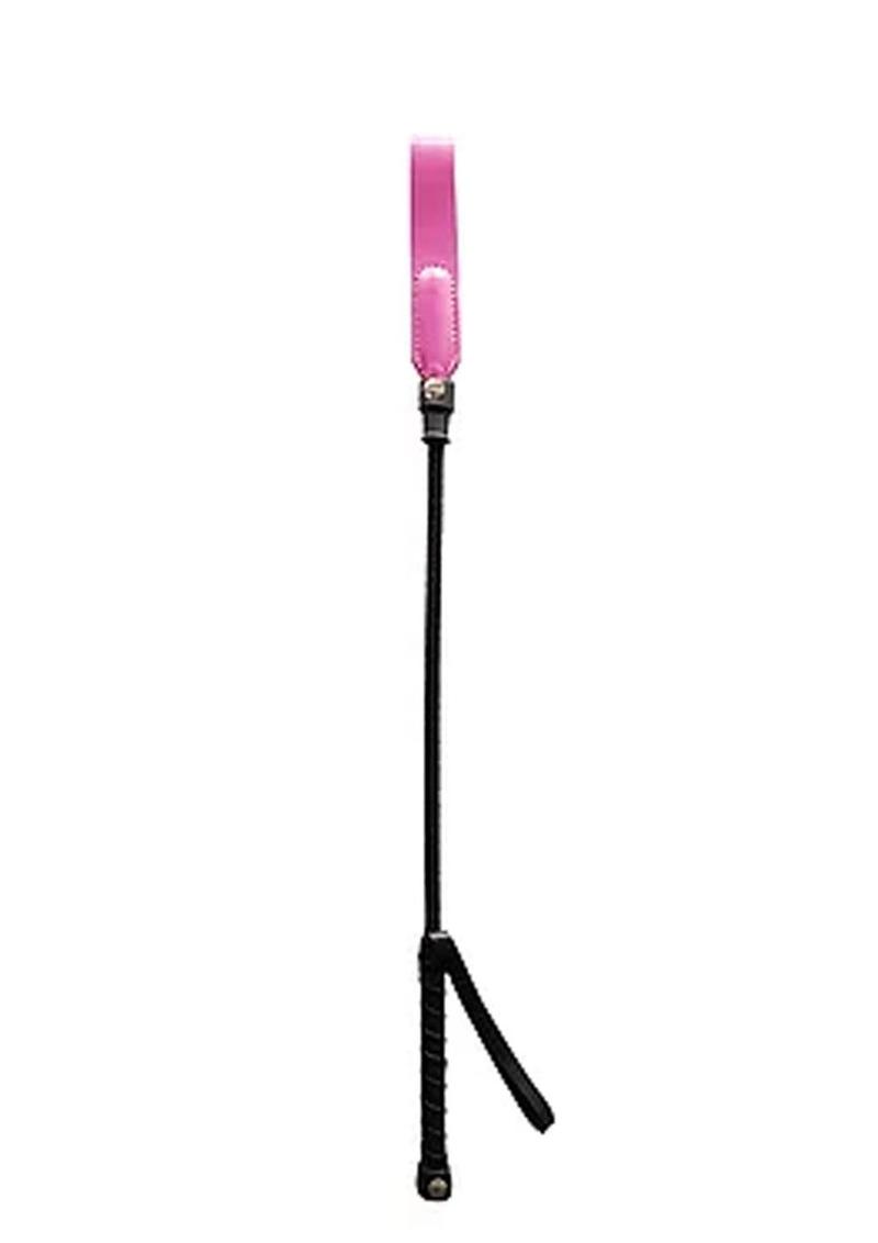 Photo of the Rouge Leather Short Riding Crop w/ Slim Tip (pink) shows its thin design.