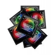 Image shows a small pile of Trustex single condoms.
