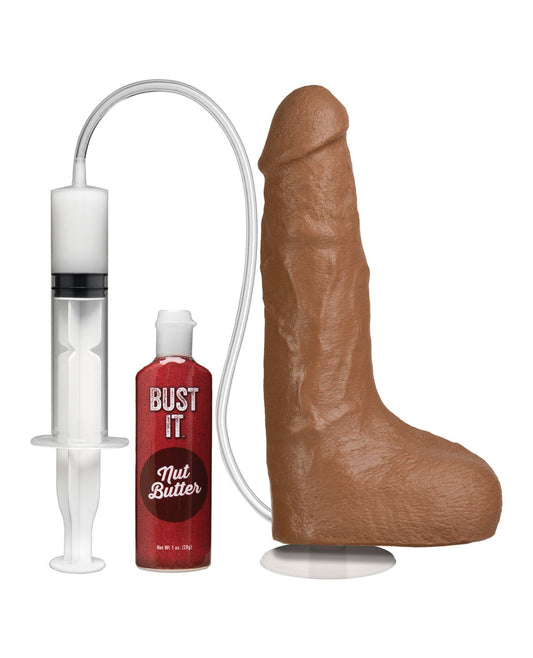 Side view of the squirting dildo and the syringe with "nut butter".