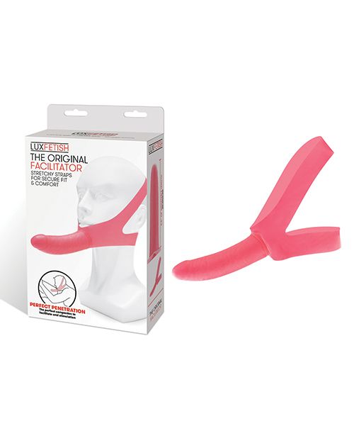 Photo of the The Original Facilitator Face Strap-On w/ Dildo from Lux Fetish/Electric Novelties (pink) next to its box.
