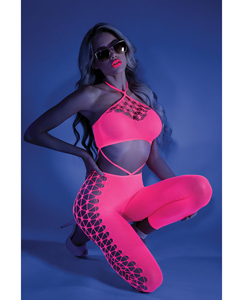 Photo of a woman in a black light room wearing the 2pc set (one size).
