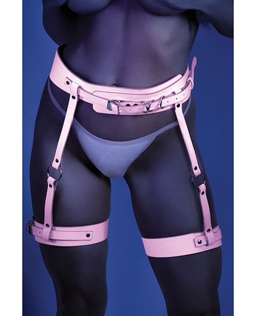 Photo of the front of a woman wearing the leg harness (panties not included) shown on a one size model (O/S piece).