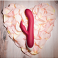 Top view of the Evolved Inflatable Bunny Rechargeable Silicone Dual Stimulating Vibrator on heart shaped flower petals.