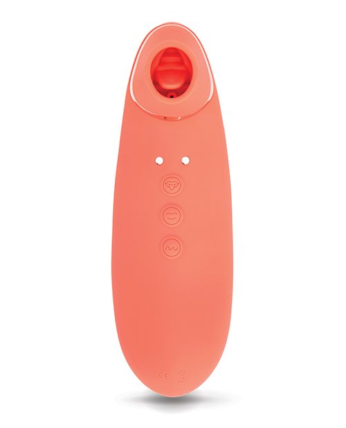 Front view of the toy shows its control buttons, clitoral opening and magnetic charging ports (coral).