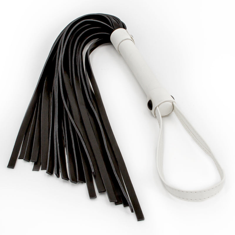 Top view of he Glo Bondage Flogger from NS Novelties shows its soft tresses and convenient size.