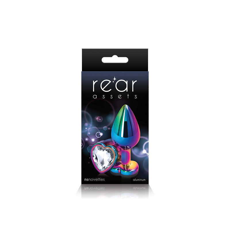 Photo of the front of the box for the Rear Assets Heart Anal Plug w/ Gem from NS Novelties (rainbow/clear).