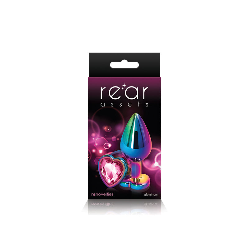 Photo of the front of the box for the Rear Assets Heart Anal Plug w/ Gem from NS Novelties (rainbow/pink).