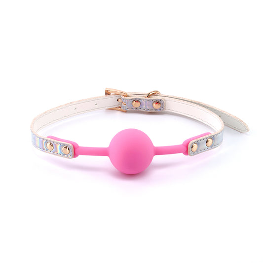 Front view of the Cosmo Bondage Ball Gag from NS Novelties shows its bright pink silicone ball and adjustable strap.