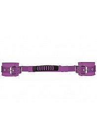Close-up of the adjustable leather handcuffs (purple).