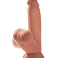 Photo shows the realistic head, frenulum, and moveable testicles of the King Cock Plus Triple Density Dildo (7in) from Pipedreams (caramel).