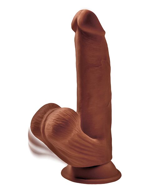 Photo shows the realistic head, frenulum, and moveable testicles of the King Cock Plus Triple Density Dildo (8in) from Pipedreams (chocoate).