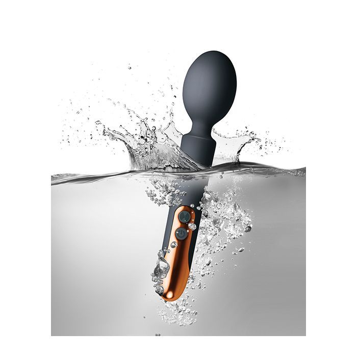 Photo shows the waterproof aspect of the Oriel Wand Massager from Rocks Off (black) with it splashing in water.