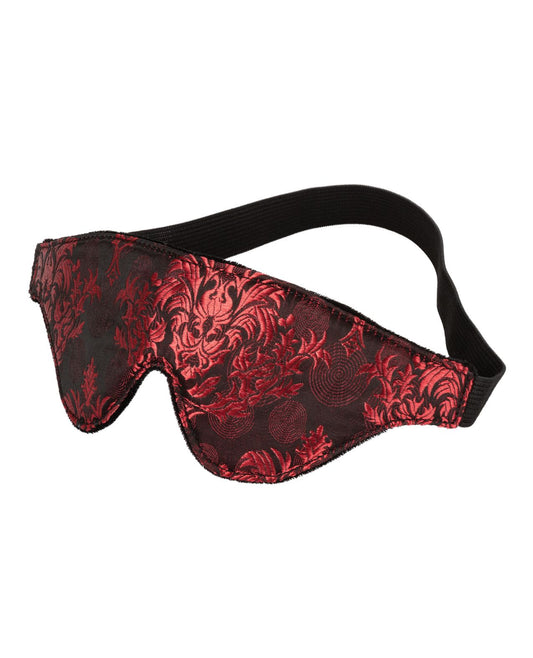 Close-up of the  Scandal Blackout Eye Mask (red/black) from CalExotics, shows the mask's unique fabric.