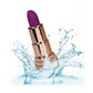 Photo of the Naughty Bits Bad Bitch Lipstick Bullet Vibrator, from CalExotics, splashing in water to show its waterproof capability.