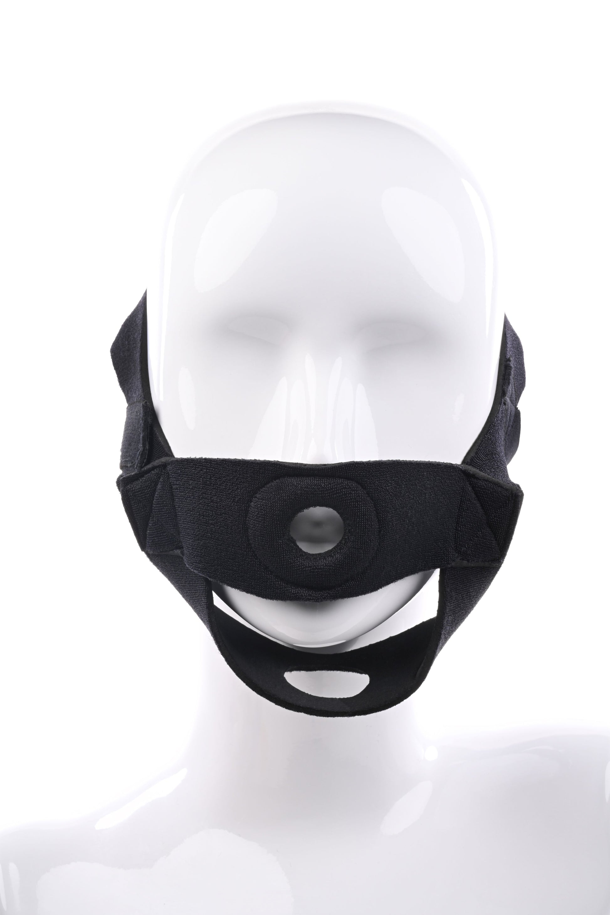 Photo of the front of a mannequin face wearing the face harness.