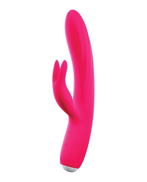 Up-right side angle view of the vibe showing its pointed rabbit ears and unique twisted shaft. It also shows the power and control buttons (pink).