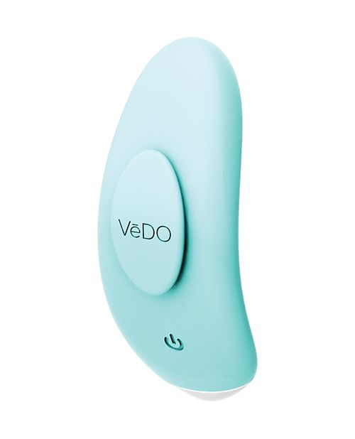 Side angle view of the panty vibe showing the power button and magnetic stay put clip (turquoise).