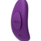 Side angle view of the panty vibe showing the power button and magnetic stay put clip (purple).